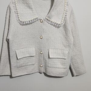 Elegant Cream Blazer with Ruffle Trim